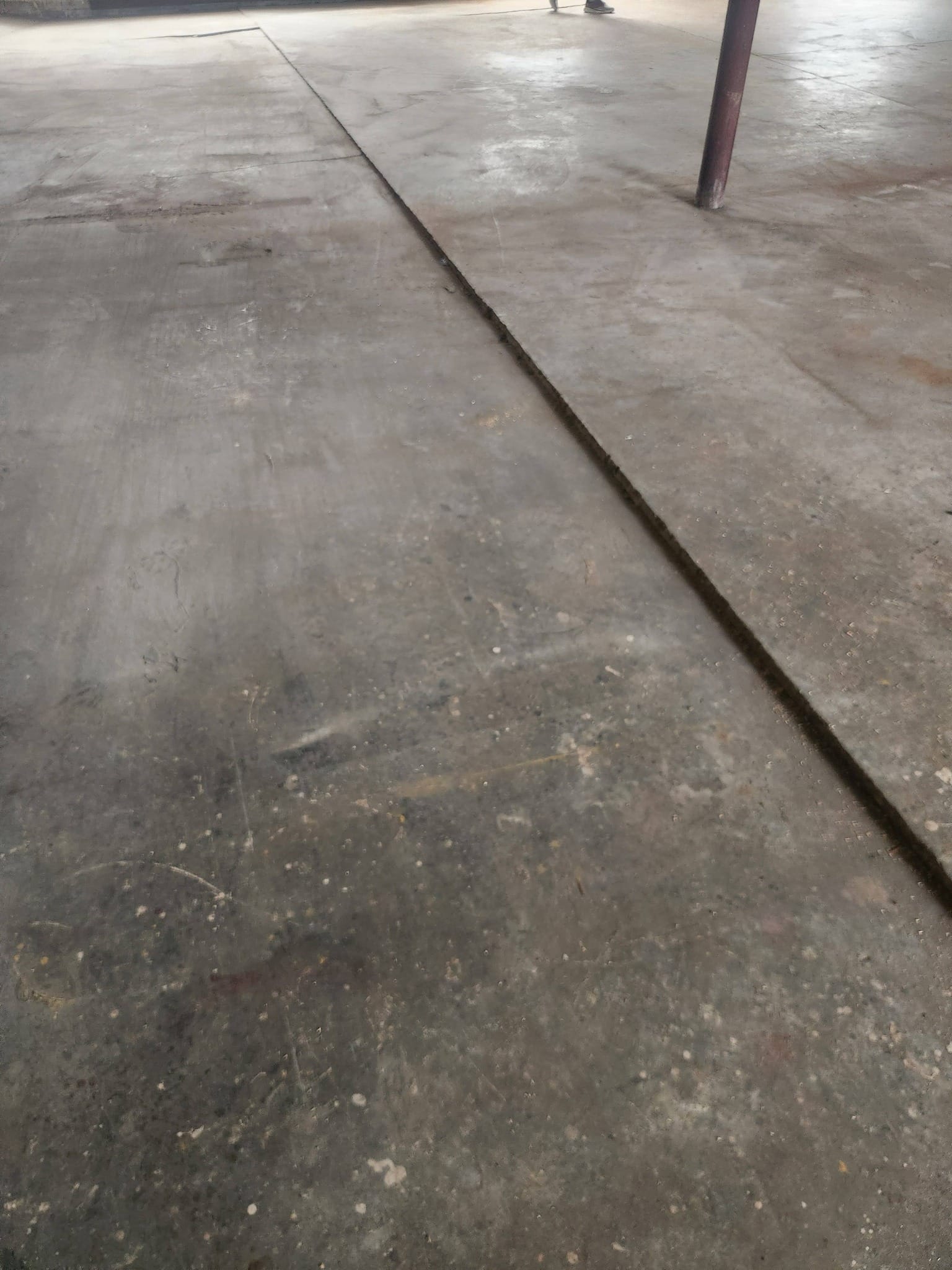 Sunken driveway repair with concrete lifting Kitchener.